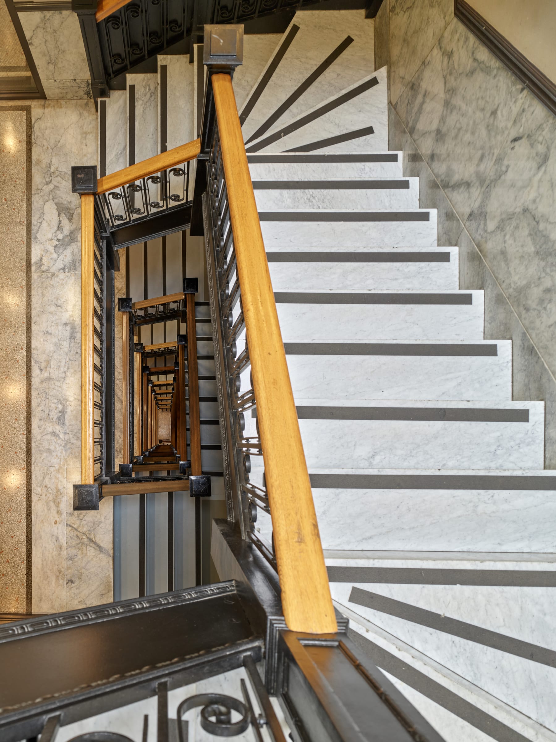 Looking down the marble stairwell of the Rogers Building