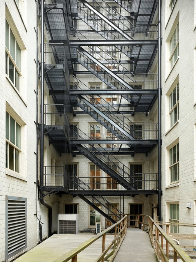 Fire escapes zigzagging up the Rogers Building light well